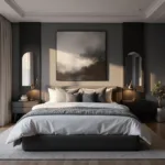 A cinematic shot of a modern grey bedroom during golden hour, featuring a platform bed with white linens and grey pillows, flanked by black bedside tables with brass lamps, sheer curtains, abstract artwork, layered textures, and moody lighting.