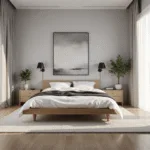 A serene minimalist bedroom featuring a low-profile oak platform bed with white linen bedding, bathed in soft morning light from floor-to-ceiling windows, with modern black sconces and an abstract canvas, set against a light grey wall.