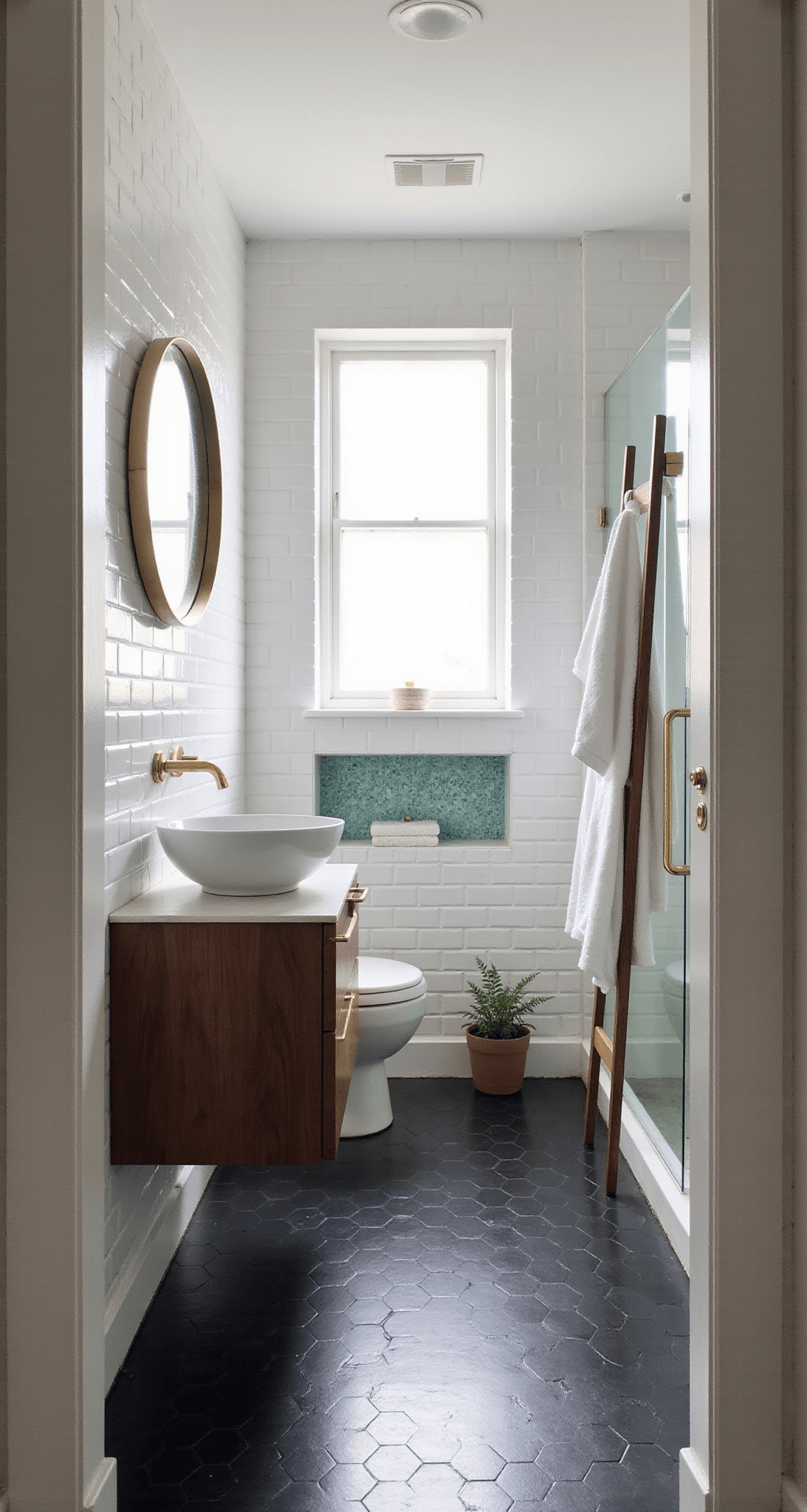 Bright, airy bathroom featuring white subway tiles, matte black hexagon flooring, a walnut floating vanity with a white vessel sink, and a glass walk-in shower, all illuminated by soft morning light.