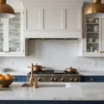 A luxurious modern kitchen featuring glass-front upper cabinets with white Shaker frames, displaying white porcelain dinnerware and crystal stemware, complemented by white quartz countertops, navy blue lower cabinets, and brass hardware. The space is illuminated by morning sunlight through floor-to-ceiling windows, showcasing pendant lights over a marble island, styled with copper cookware, fresh herbs, and citrus fruits, captured in a photorealistic 8K image with soft diffused lighting and warm tones.