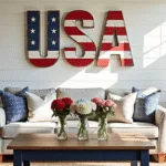 A sun-drenched modern farmhouse living room decorated with DIY patriotic items, featuring a large "USA" sign, a gray sofa with navy pillows, mason jar centerpieces with flowers, faux firecrackers on the mantel, and a pool noodle wreath, all under warm natural light.