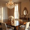 A luxurious dining room bathed in golden hour light, featuring a mahogany table, cream velvet chairs, elegant damask wallpaper, and a crystal chandelier, with fresh hydrangeas as a centerpiece.