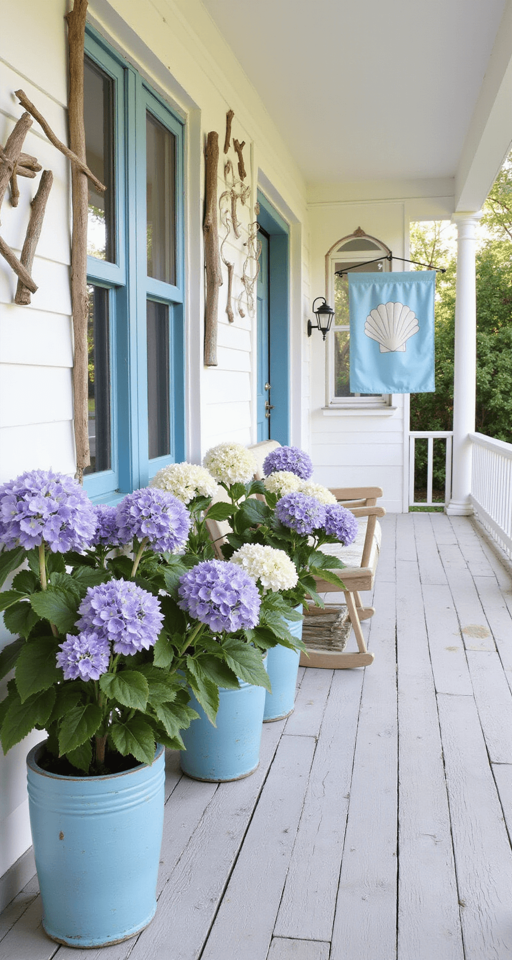 Simple Spring Porch Decor Ideas That Actually Work (No Fancy Skills Required) A coastal-inspired porch featuring weathered wood flooring, a soft blue and white color palette, nautical-themed wind chimes, and potted lavender and white hydrangeas in distressed blue ceramic planters, illuminated by soft afternoon light.